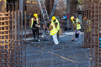 WORKERS_POURING_CEMENT_ON_SITE.jpg