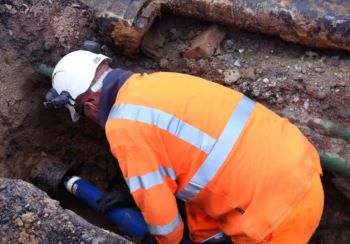 ANGLIAN WATER EMPLOYEE TRENCH WATER  PIPE