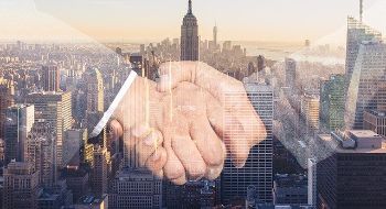 BUSINESS GENERIC HANDSHAKE CITY SKYLINE 1