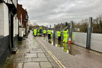 ENV AGENCY BEWDLEY FLOOD BARRIERS BEING PUT IN PLACE
