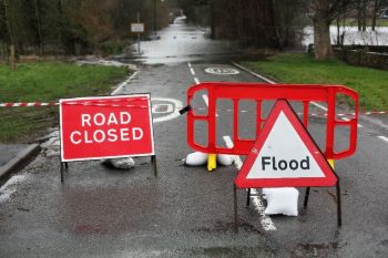 FLOODS Road closed and flood sign