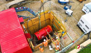 Lowering a tunnel boring machine into place