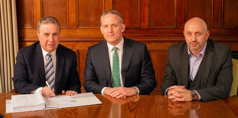MD signing Clancy contract L-R Paul Butler SEWater Matt Cannon Clancy  David Hinton SEWater 1