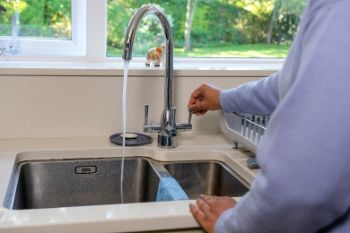 Tap running in kitchen
